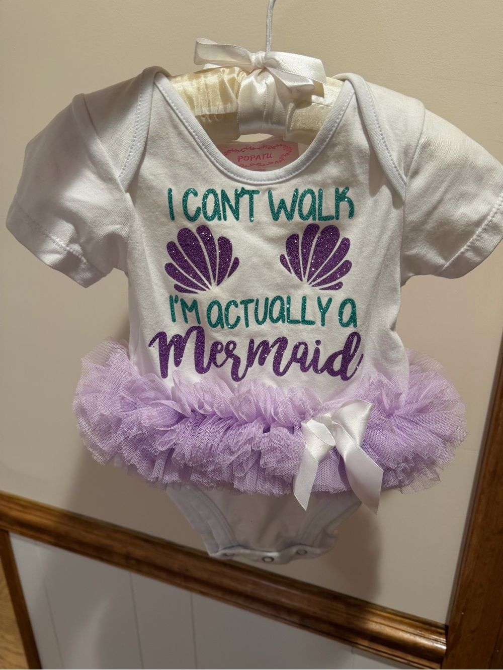 Popatu White Baby Onesie with Teal Glitter Mermaid Text and Purple Shells